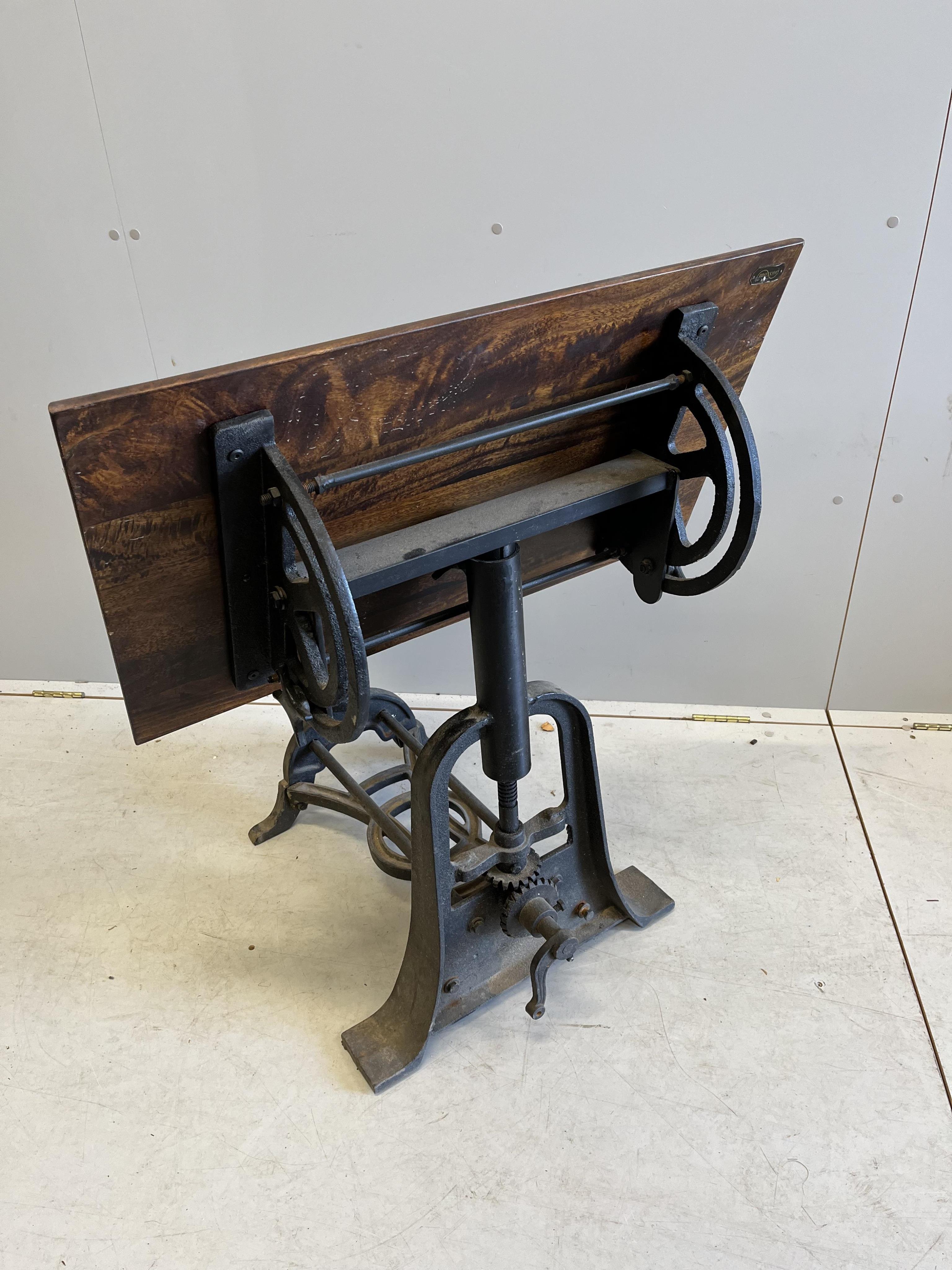 A late 19th century mahogany and cast iron adjustable drafting table, width 79cm, height 90cm